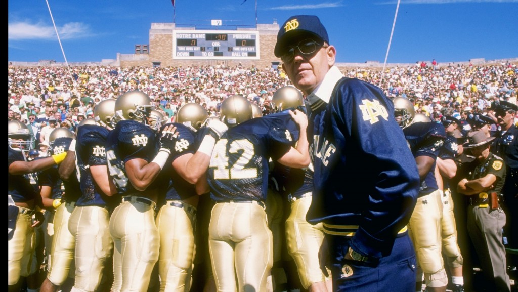 SOUTH BEND, IN - OCTOBER 15: Head coach Lou Holtz of the Notre Dame Fighting Irish stands on the sidelines during the first quarter in the game against the Miami Hurricanes on October 15, 1988 at Notre Dame Stadium in South Bend, Indiana. The Fighting Irish defeated the Hurricanes 31-30. (Photo by Jonathan Daniel/Getty Images)